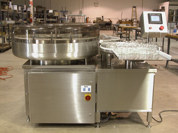 Laveuses rotatives de flacons